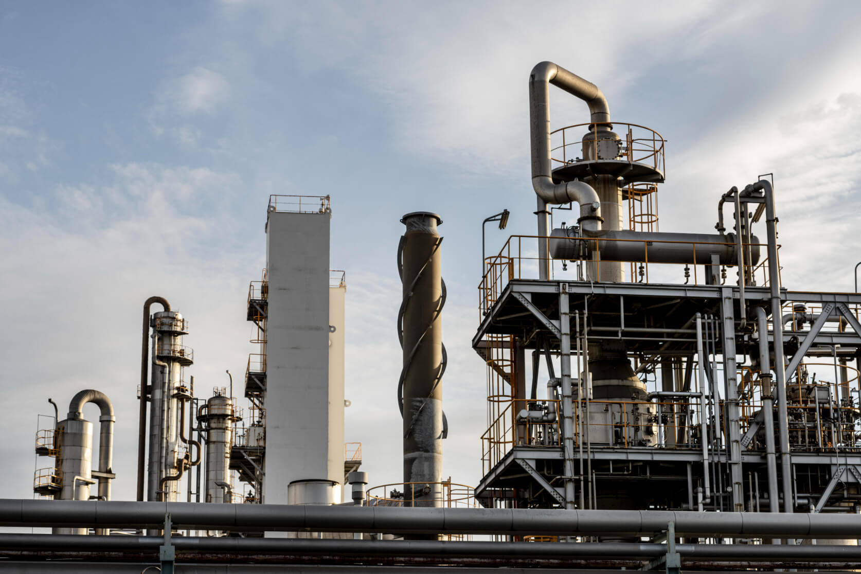 industrial plant representing project controls systems improving performance and reporting